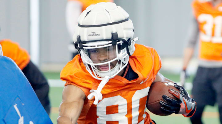 Oklahoma State's Brennan Presley runs through drills during an Oklahoma State University Cowboys spring football practice in Stillwater, Okla., Tuesday, March 26, 2024.