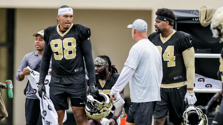 Jul 29, 2022; Metairie, LA, USA;  New Orleans Saints defensive end Payton Turner (98) and defensive end Cameron Jordan (94) during training camp at Ochsner Sports Performance Center. Mandatory Credit: Stephen Lew-USA TODAY Sports