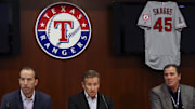 Jul 2, 2019; Arlington, TX, USA; (From left) Los Angeles Angels manager Brad Ausmus and general manager Billy Eppler and owner Arte Moreno and president John Carpino  during a press conference about the death of pitcher Tyler Skaggs before the game against the Texas Rangers at Globe Life Park in Arlington.