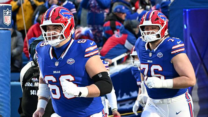 Jan 4, 2026; Orchard Park, New York, USA; Buffalo Bills center Connor McGovern (66) and guard David Edwards (76) lead the team onto the field before a game against the New York Jets at Highmark Stadium. Mandatory Credit: Mark Konezny-Imagn Images