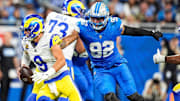 Detroit Lions defensive end Marcus Davenport (92) pressures Los Angeles Rams quarterback Matthew Stafford (9) 