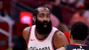 Nov 13, 2024; Houston, Texas, USA; LA Clippers guard James Harden (1) handles the ball against Houston Rockets forward Jabari Smith Jr (10) during the first quarter at Toyota Center. Mandatory Credit: Erik Williams-Imagn Images