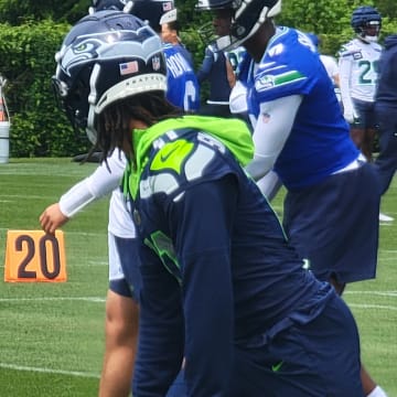 Jaxon Smith-Njigba awaits the snap during a drill at Seahawks training camp at the VMAC.