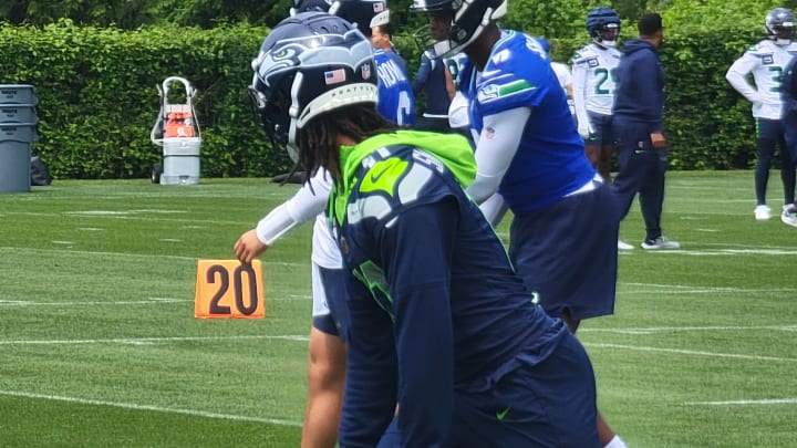 Jaxon Smith-Njigba awaits the snap during a drill at Seahawks training camp at the VMAC.