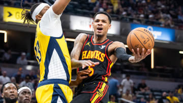 Ex-Husky guard Dejounte Murray, shown driving on the Pacers, has been traded from Atlanta to New Orleans. 