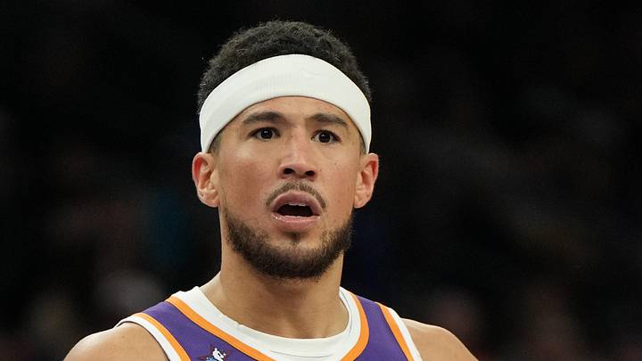 Feb 7, 2026; Phoenix, Arizona, USA; Phoenix Suns guard Devin Booker (1) reacts after a foul call against the Philadelphia 76ers during the second half of an NBA game at Mortgage Matchup Center. Mandatory Credit: Rick Scuteri-Imagn Images