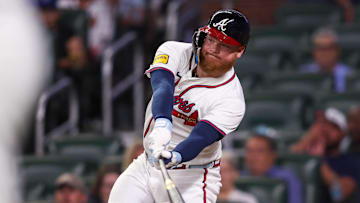 Jun 17, 2025; Atlanta, Georgia, USA; Atlanta Braves left fielder Alex Verdugo (8) hits a single against the New York Mets in the eighth inning at Truist Park. Mandatory Credit: Brett Davis-Imagn Images