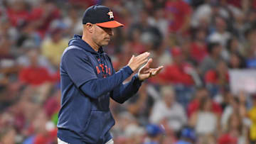 Aug 26, 2024; Philadelphia, Pennsylvania, USA; Houston Astros manager Joe Espada (19) walks to the pitchers mound against the Philadelphia Phillies during the fourth inning at Citizens Bank Park. Mandatory Credit: Eric Hartline-Imagn Images