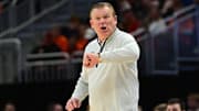 Mar 23, 2025; Milwaukee, WI, USA;  Illinois Fighting Illini head coach Brad Underwood reacts during the second half in the second round of the NCAA Tournament against the Kentucky Wildcats at Fiserv Forum. Mandatory Credit: Benny Sieu-Imagn Images