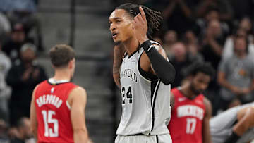 Nov 7, 2025; San Antonio, Texas, USA;  San Antonio Spurs guard Devin Vassell (24) celebrates leading over the Houston Rockets during the second quarter at Frost Bank Center. Mandatory Credit: Dustin Safranek-Imagn Images