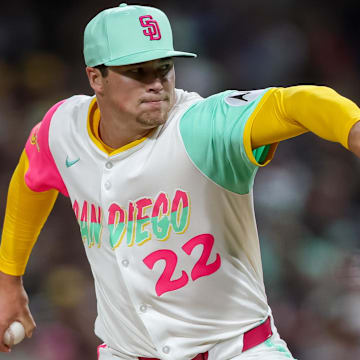 Aug 1, 2025; San Diego, California, USA; San Diego Padres pitcher Mason Miller (22) pitches during the eighth inning against the St. Louis Cardinals at Petco Park. Mandatory Credit: Chadd Cady-Imagn Images