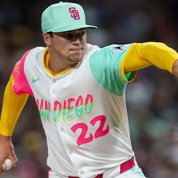 Aug 1, 2025; San Diego, California, USA; San Diego Padres pitcher Mason Miller (22) pitches during the eighth inning against the St. Louis Cardinals at Petco Park. Mandatory Credit: Chadd Cady-Imagn Images