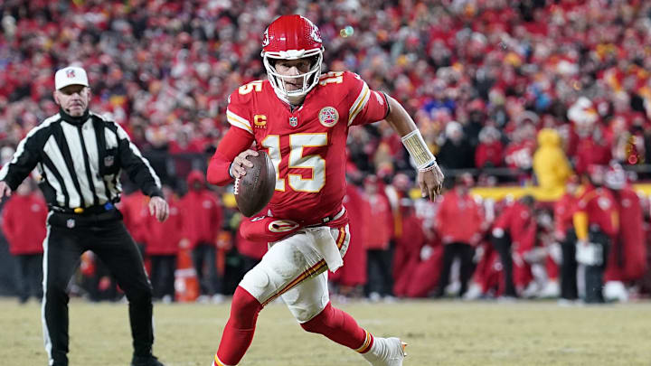 Kansas City Chiefs quarterback Patrick Mahomes (15) rushes the ball against the Buffalo Bills during the first half in the AFC Championship game at GEHA Field at Arrowhead Stadium.