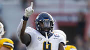 Dec 30, 2023; Tucson, AZ, USA; Toledo Rockets defensive tackle Darius Alexander (9) against the Wyoming Cowboys in the Arizona Bowl at Arizona Stadium. Mandatory Credit: Mark J. Rebilas-USA TODAY Sports