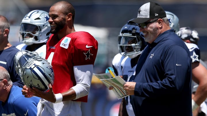 Jul 30, 2024; Oxnard, CA, USA; Dallas Cowboys quarterback Dak Prescott (4) and head coach Mike McCarthy during training camp at the River Ridge Playing Fields in Oxnard, California. 