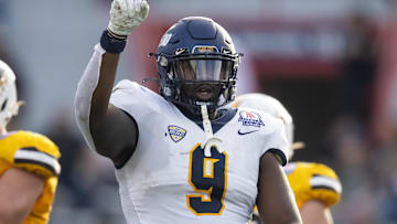 Dec 30, 2023; Tucson, AZ, USA; Toledo Rockets defensive tackle Darius Alexander (9) against the Wyoming Cowboys in the Arizona Bowl at Arizona Stadium. Mandatory Credit: Mark J. Rebilas-USA TODAY Sports