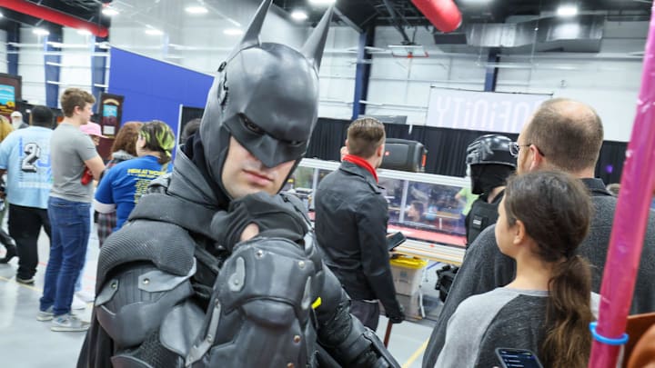 Batman kept an eye on things during Infinity Con at the Alachua County Sports and Event Center on Nov. 15, 2025, in Gainesville. The two-day event featured fantasy characters, displays, gaming, and recreations of characters from anime and video games.