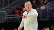Mar 23, 2025; Milwaukee, WI, USA;  Illinois Fighting Illini head coach Brad Underwood reacts during the second half in the second round of the NCAA Tournament against the Kentucky Wildcats at Fiserv Forum. Mandatory Credit: Benny Sieu-Imagn Images