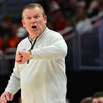 Mar 23, 2025; Milwaukee, WI, USA;  Illinois Fighting Illini head coach Brad Underwood reacts during the second half in the second round of the NCAA Tournament against the Kentucky Wildcats at Fiserv Forum. Mandatory Credit: Benny Sieu-Imagn Images