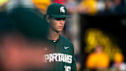 Michigan State pitcher Joseph Dzierwa (16) returns to the dugout after closing out an inning during a NCAA Big Ten Conference baseball game against Iowa, Friday, May 12, 2023, at Duane Banks Field in Iowa City, Iowa.