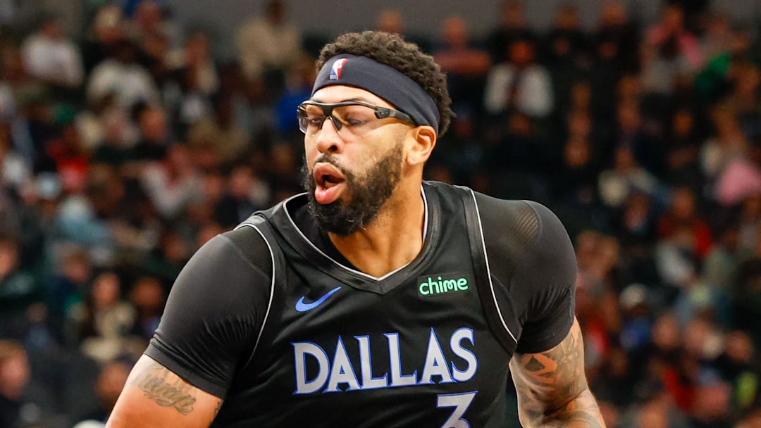 Dallas Mavericks forward Anthony Davis handles the ball during the third quarter against the Houston Rockets Dallas Mavericks forward Anthony Davis handles the ball during the third quarter against the Houston Rockets