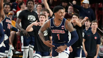 Arizona Wildcats guard Caleb Love (1) reacts after sinking a 3-point shot during a Big 12 men's basketball game against the Arizona State Sun Devils at Desert Financial Arena on Feb. 1, 2025, in Tempe.