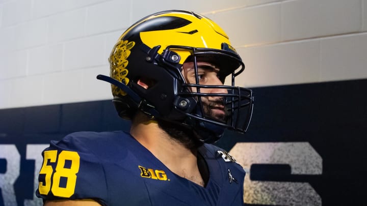 Jan 8, 2024; Houston, TX, USA; Michigan Wolverines offensive lineman Giovanni El-Hadi (58) against the Washington Huskies during the 2024 College Football Playoff national championship game at NRG Stadium. Mandatory Credit: Mark J. Rebilas-USA TODAY Sports