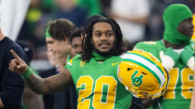 Oregon Ducks running back Jordan James (20) celebrates against the Liberty Flames during the 2024 Fiesta Bowl at State Farm S