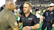 Nov 9, 2024; Denton, Texas, USA; North Texas Mean Green head coach Eric Morris greets Army Black Knights head coach Jeff Monken after Army’s 14-3 win during the second half at DATCU Stadium. Mandatory Credit: Danny Wild-Imagn Images