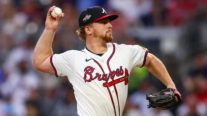 Jun 17, 2025; Atlanta, Georgia, USA; Atlanta Braves starting pitcher Spencer Schwellenbach (56) throws against the New York Mets in the first inning at Truist Park. Mandatory Credit: Brett Davis-Imagn Images