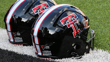 Sep 21, 2024; Lubbock, Texas, USA;  A general view of Texas Tech Red Raiders helmets on the turf before the game between the Arizona State Sun Devils and the Texas Tech Red Raiders at Jones AT&T Stadium and Cody Campbell Field. Mandatory Credit: Michael C. Johnson-Imagn Images