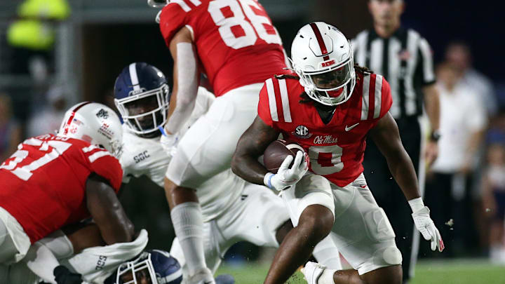 Sep 21, 2024; Oxford, Mississippi, USA; Mississippi Rebels running back Matt Jones (0) runs the ball during the first half against the Georgia Southern Eagles at Vaught-Hemingway Stadium. Mandatory Credit: Petre Thomas-Imagn Images