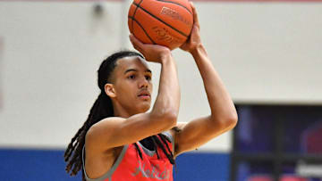 Holliday's Keitenn Bristow shoots a three during the bi-district playoffs against Early on Monday, February 19, 2024 at Graham High School.