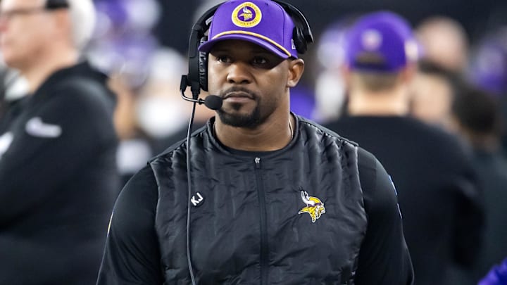 Jan 13, 2025; Glendale, AZ, USA; Minnesota Vikings defensive coordinator Brian Flores against the Los Angeles Rams during an NFC wild card game at State Farm Stadium. Mandatory Credit: Mark J. Rebilas-Imagn Images