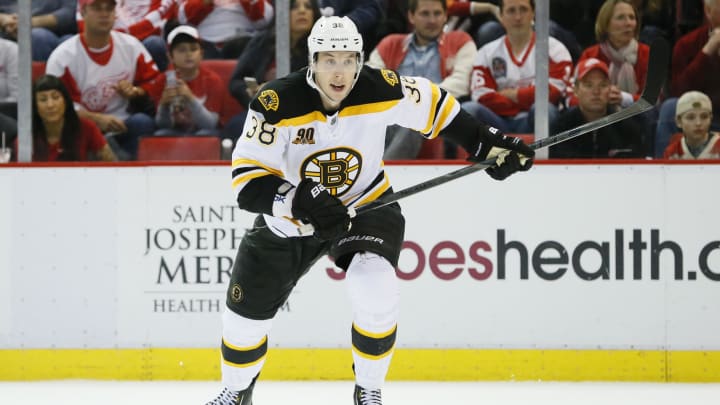 Apr 22, 2014; Detroit, MI, USA; Boston Bruins left wing Jordan Caron (38) skates down the ice in the third period against the Detroit Red Wings in game three of the first round of the 2014 Stanley Cup Playoffs at Joe Louis Arena. Mandatory Credit: Rick Osentoski-USA TODAY Sports