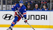 Oct 5, 2023; New York, New York, USA;  New York Rangers right wing Kaapo Kakko (24) skates across the blue line against the Boston Bruins  during the third at Madison Square Garden. Mandatory Credit: Dennis Schneidler-Imagn Images