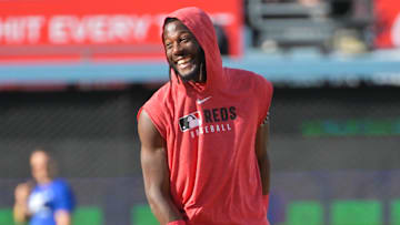 Sep 30, 2025; Los Angeles, California, USA; Cincinnati Reds shortstop Elly De La Cruz (44) warms up before the game against the Los Angeles Dodgers in game one of the Wildcard round for the 2025 MLB playoffs at Dodger Stadium. Mandatory Credit: Jayne Kamin-Oncea-Imagn Images