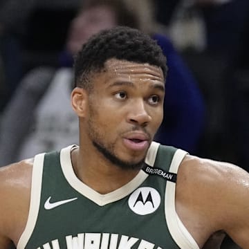 Apr 25, 2025; Milwaukee, Wisconsin, USA; Milwaukee Bucks forward Giannis Antetokounmpo (34) on the bench as the clock counts down against the Indiana Pacers during game three of first round for the 2024 NBA Playoffs at Fiserv Forum. Mandatory Credit: Michael McLoone-Imagn Images