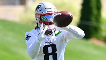 Jul 23, 2025; Foxborough, MA, USA; New England Patriots wide receiver Stefon Diggs (8) makes a catch during training camp at Gillette Stadium. Mandatory Credit: Eric Canha-Imagn Images