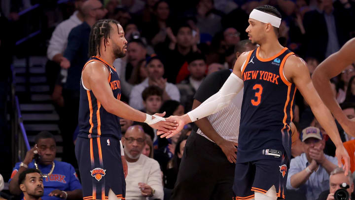 Jan 30, 2024; New York, New York, USA; New York Knicks guard Jalen Brunson (11) high fives guard Josh Hart (3) as Utah Jazz guard Kris Dunn (11) reacts during the third quarter at Madison Square Garden. Mandatory Credit: Brad Penner-USA TODAY Sports