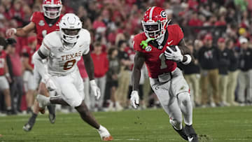 Georgia Bulldogs wide receiver Zachariah Branch (1) runs the ball in the first half against the Texas Longhorns at Sanford Stadium.