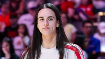 Aug 7, 2025; Phoenix, Arizona, USA; Indiana Fever injured guard Caitlin Clark in attendance against the Phoenix Mercury during an WNBA game at PHX Arena. Mandatory Credit: Mark J. Rebilas-Imagn Images
