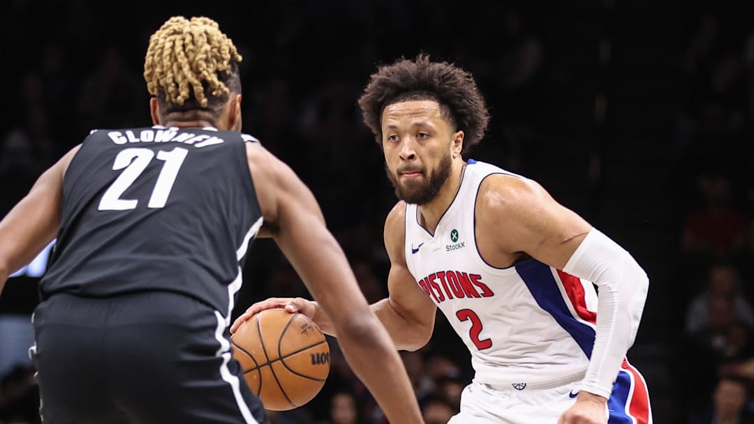 Mar 10, 2026; Brooklyn, New York, USA;  Detroit Pistons guard Cade Cunningham (2) looks to drive past Brooklyn Nets forward Noah Clowney (21) in the third quarter at Barclays Center. Mandatory Credit: Wendell Cruz-Imagn Images