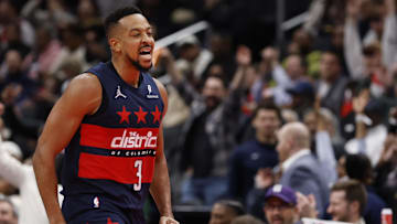 Nov 25, 2025; Washington, District of Columbia, USA; Washington Wizards guard CJ McCollum (3) reacts after making a three point field goal against the Atlanta Hawks in the first half at Capital One Arena. Mandatory Credit: Geoff Burke-Imagn Images