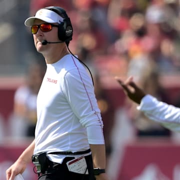 Oct 12, 2024; Los Angeles, California, USA;  USC Trojans head coach Lincoln Riley during a time out against the Penn State Nittany Lions in the first half at United Airlines Field at Los Angeles Memorial Coliseum. Mandatory Credit: Jayne Kamin-Oncea-Imagn Images