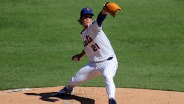 Sep 18, 2025; New York City, New York, USA; New York Mets starting pitcher Jonah Tong (21) pitches against the San Diego Padres during the second inning at Citi Field.