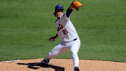 Sep 18, 2025; New York City, New York, USA; New York Mets starting pitcher Jonah Tong (21) pitches against the San Diego Padres during the second inning at Citi Field. Mandatory Credit: Brad Penner-Imagn Images