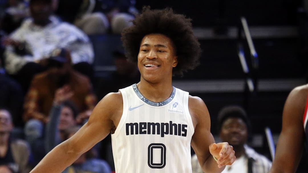Dec 5, 2025; Memphis, Tennessee, USA; Memphis Grizzlies forward Jaylen Wells (0) reacts with forward Santi Aldama (7) during the third quarter against the Los Angeles Clippers at FedExForum. Mandatory Credit: Petre Thomas-Imagn Images