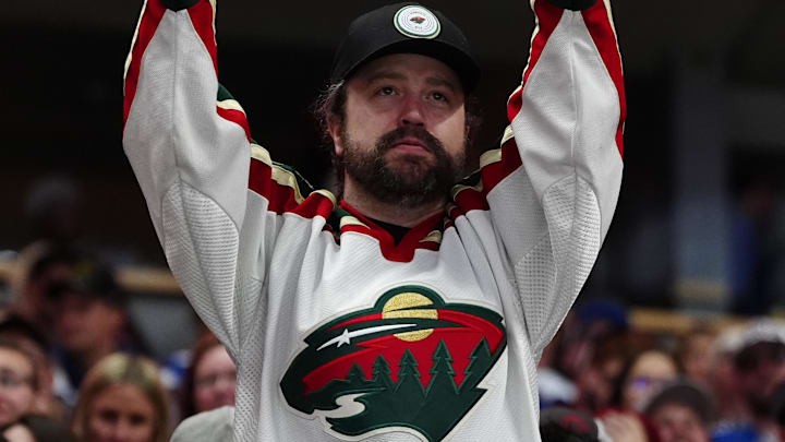May 3, 2026; Denver, Colorado, USA; Minnesota Wild fan cheers against the Colorado Avalanche during the second period in game one of the second round of the 2026 Stanley Cup Playoffs at Ball Arena. (Mandatory Credit: Ron Chenoy-Imagn Images)