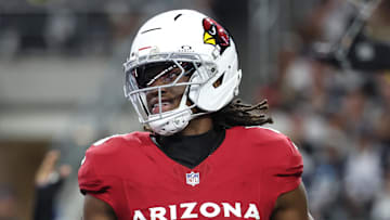 Nov 3, 2025; Arlington, Texas, USA; Arizona Cardinals wide receiver Marvin Harrison Jr. (18) scores a touchdown against the Dallas Cowboys in the first half at AT&T Stadium. Mandatory Credit: Kevin Jairaj-Imagn Images